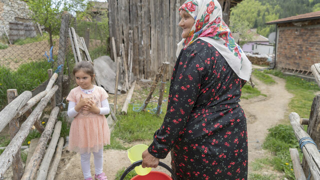 Sabie Djikova with her granddaughter, 5 year-old Sabie in the yard behind the house that is shared by three generations in the Muslim majority village of Ablanitsa. The family keeps three cows as well as rabbits and a horse. Sabie Djikova with her granddaughter, 5 year-old Sabie in the yard behind the house that is shared by three generations in the Muslim majority village of Ablanitsa. The family keeps three cows as well as rabbits and a horse.