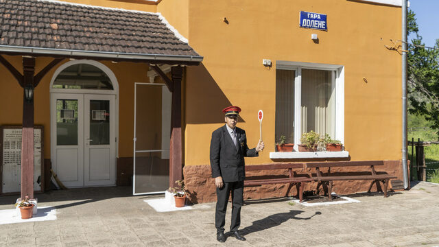 The station master stops an incoming train at Station Dolene. Station masters not only direct the incoming trains but are also in phone communication with other station masters, giving signals to let each other know whether or not it’s alright to send the train onwards. The station master stops an incoming train at Station Dolene. Station masters not only direct the incoming trains but are also in phone communication with other station masters, giving signals to let each other know whether or not it’s alright to send the train onwards.