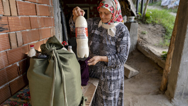 Nearly every day, Sabie Djikova carries 20 liters of fresh milk from her home in Ablanitsa to the station Tsvetino. She boards the train to Velingrad. In Velingrad, she makes home deliveries before returning back later in the morning. I carried 30 or 40 when I was younger," she says. Nearly every day, Sabie Djikova carries 20 liters of fresh milk from her home in Ablanitsa to the station Tsvetino. She boards the train to Velingrad. In Velingrad, she makes home deliveries before returning back later in the morning. I carried 30 or 40 when I was younger," she says.