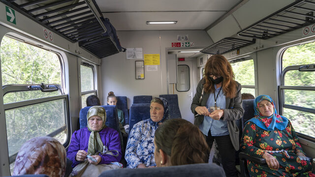 A train conductor checks rail passes and sells tickets to a group of women heading home by train from Velingrad after selling their milk and other products. Sabie gets a pensioner’s discount and pays 216 BGN per year. A train conductor checks rail passes and sells tickets to a group of women heading home by train from Velingrad after selling their milk and other products. Sabie gets a pensioner’s discount and pays 216 BGN per year.