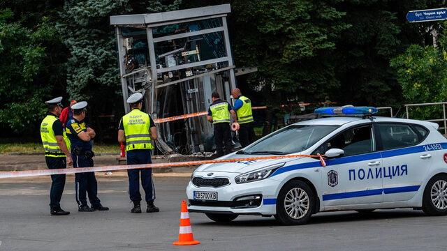 The scene of the crash site at the European Union metro station. The elevator booth is shattered from the impact